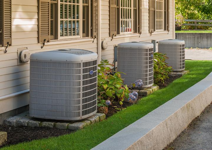 Air conditioners outside townhomes.